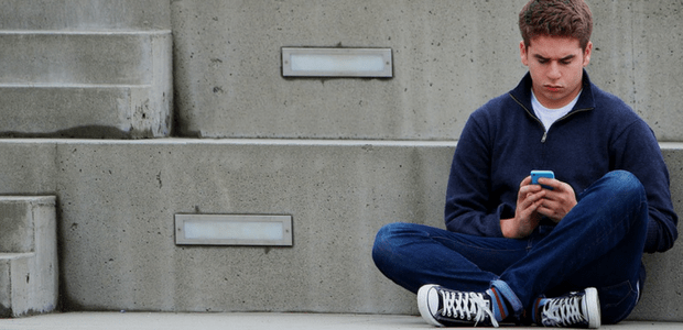 Teenage boy on phone