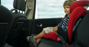 Child In Booster Seat