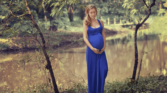 Pregnant woman outdoors