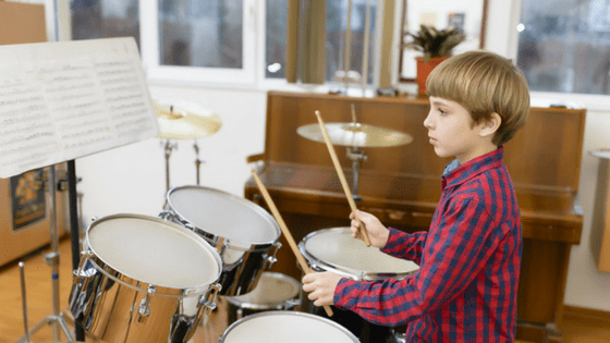 Kid playing drums