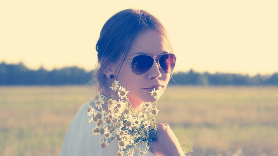 Teenage girl with flowers