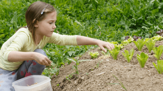 Pretty Blonde Girl Gardening