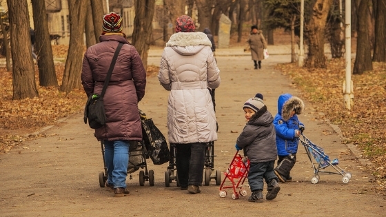 Moms toddlers and strollers