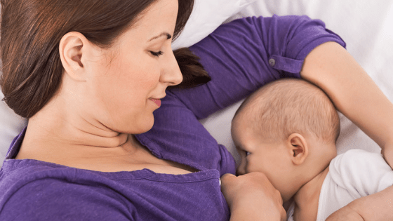 Mom In Purple Breastfeeding