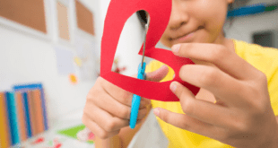 Kids Activity cutting out paper heart