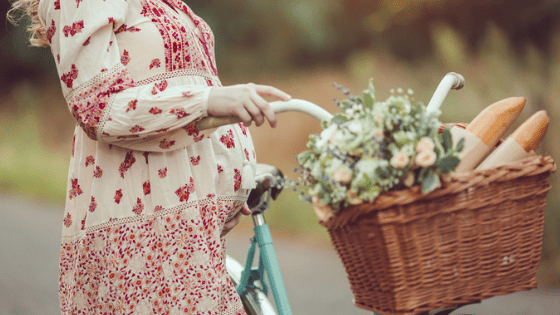 Pregnant woman with bicyle