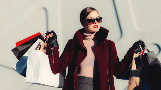 Smart modern woman with shopping bags