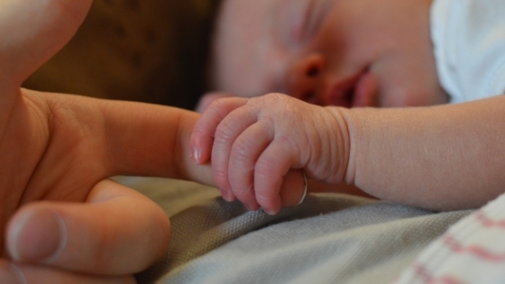 Baby Holding Finger