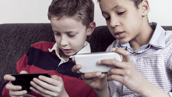 Kids playing Samsung phones