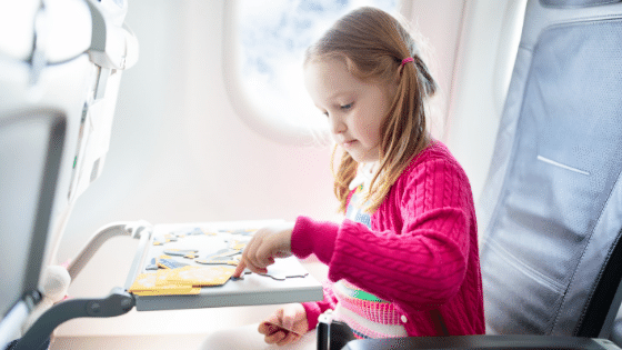 Girl playing on plane