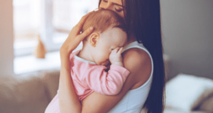 Mom comforting crying baby