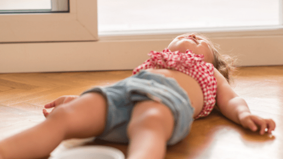 Toddler Lying On Floor