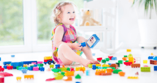 Toddler playing with lego