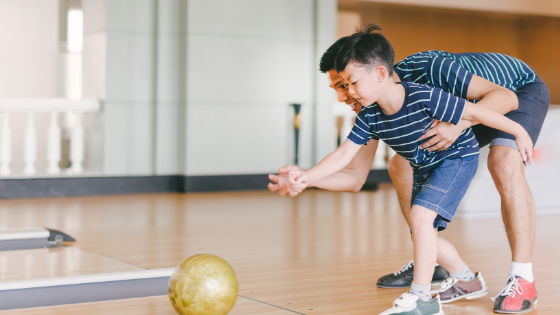 Father and son bowling