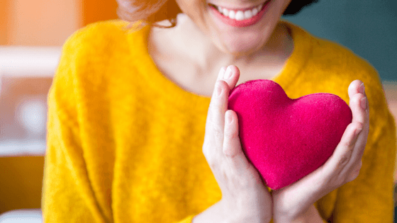 Woman holding a heart