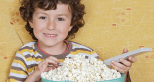 Child with popcorn