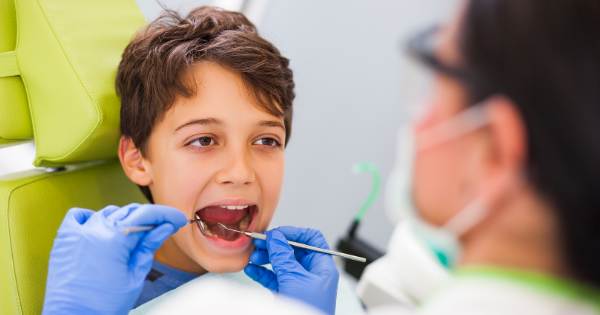 Dentist Treating Little Kid