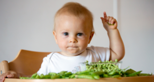 Child Eating Greens