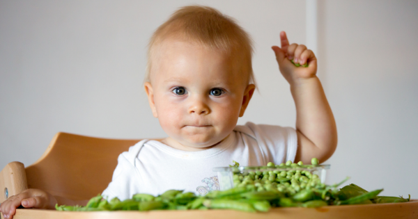 Child Eating Greens