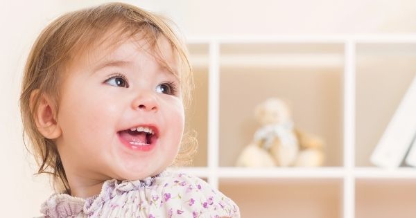 Beautiful toddler girl laughing