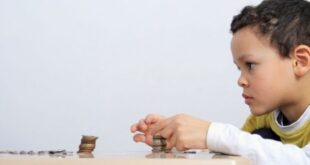 Child counting coins