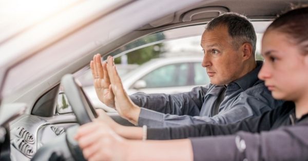 Dad Teaching Teen How To Drive