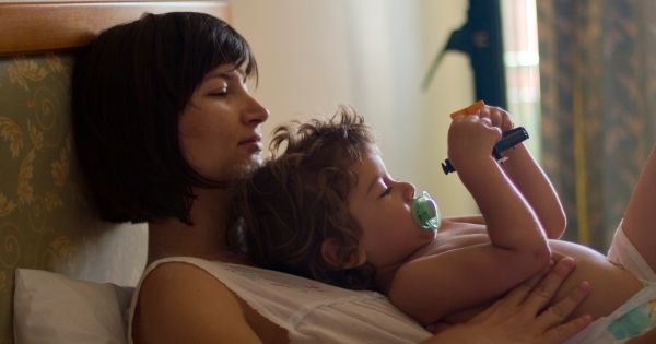 Mom resting with child