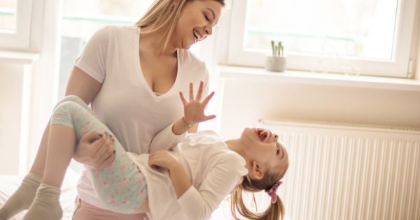 Mother daughter playing