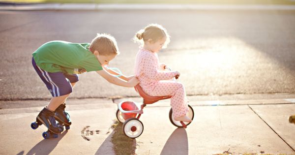 Siblings playing