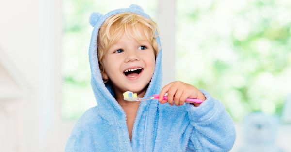 Boy brushing teeth