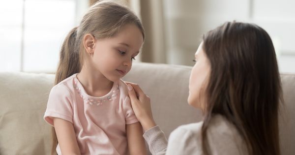 Mother talking to daughter